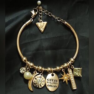 Y2K Guess Bracelet Goldtone Logo Bangle Bracelet Rhinestones Star & Moon Pendant